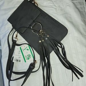 Crossbody tassel bag with snap closure